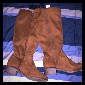 Never worn . high boots .